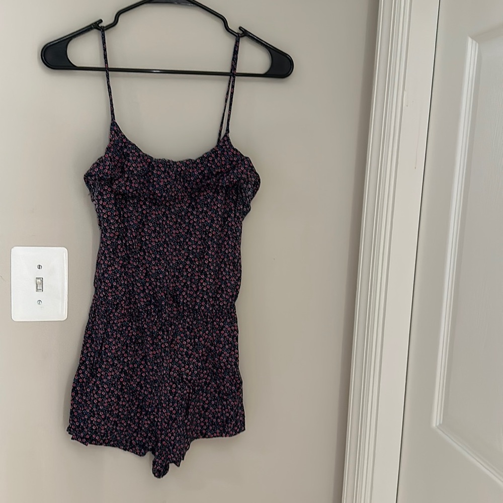 Simple light weight romper with floral design!